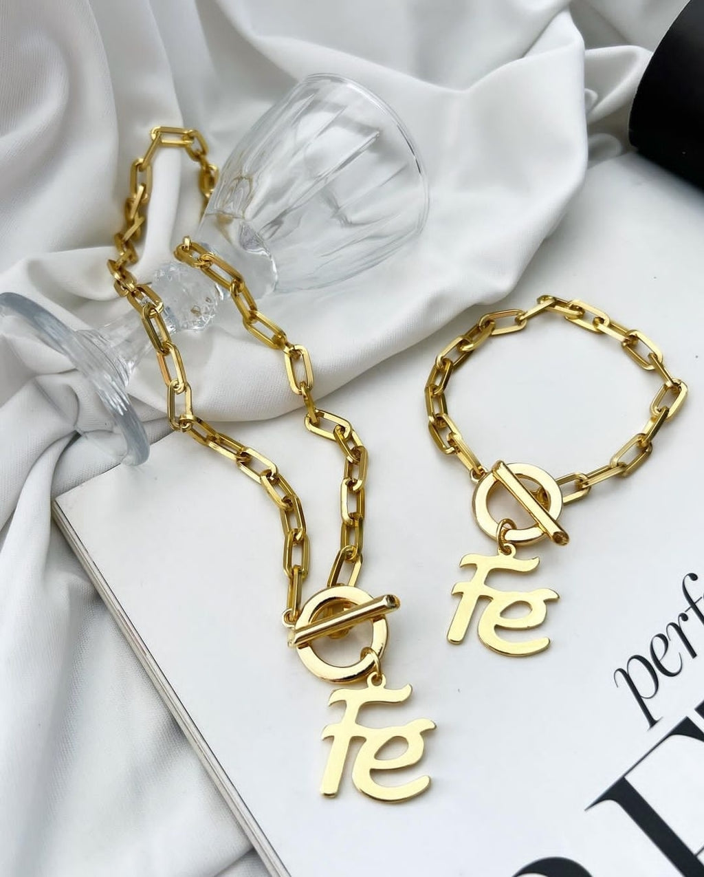 18k gold plated necklace with Faith pendant and chain with chain link.