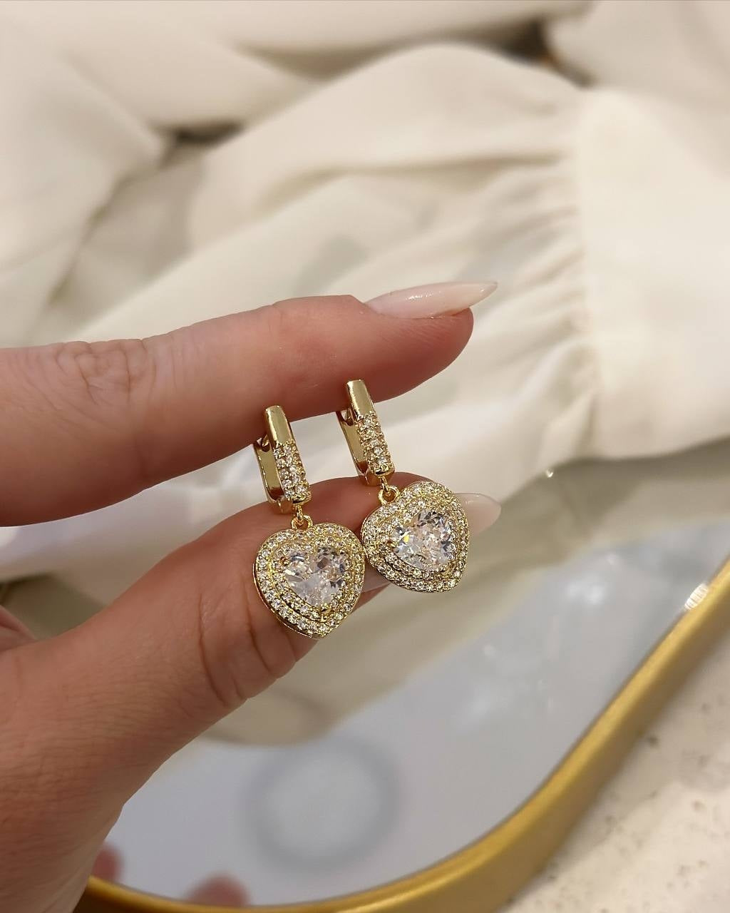 18k gold plated Click studded heart earring.