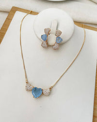 Conjunto Folheado a ouro 18k com 3 corações de zirconia fusion e cravejado.