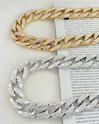 Colar e pulseira elos grandes cravejado dourado e prata.