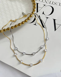 Choker prata  e folheado ouro 18k  com pingentes de corações de zirconias cristal .