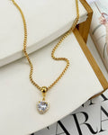 Colar Folheado a ouro 18k veneziana com pingente de coração zirconia com borda cravejada.