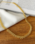Choker Folheado a ouro 18k malha entrelaçadas.