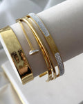 Bracelete de Aço Inox Dourado semijoias Inspiração Cartier prego com zirconias cravejadas.