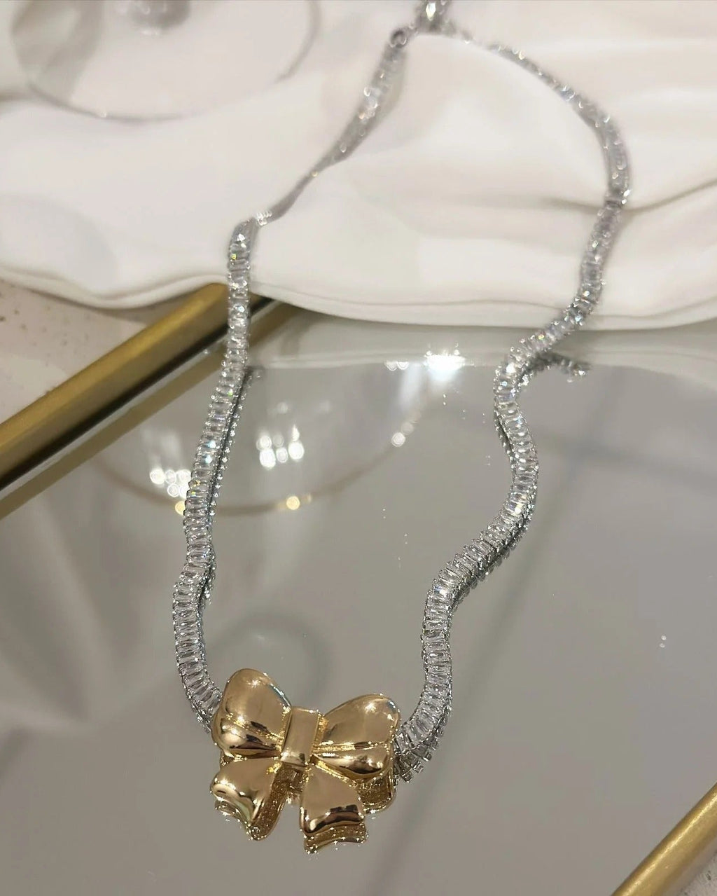 Colar Riviera prata e folheado a ouro 18k mix Laço dourado ou prata .