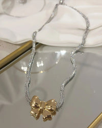 Colar Riviera prata e folheado a ouro 18k mix Laço dourado ou prata .