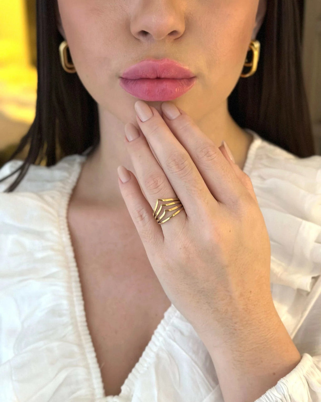 Anel de Aço Inoxidável dourado 4 fileiras vazadas tamanhos variados.