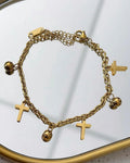 Pulseira de Aço Inoxidável dourado com cruz e Esferas .