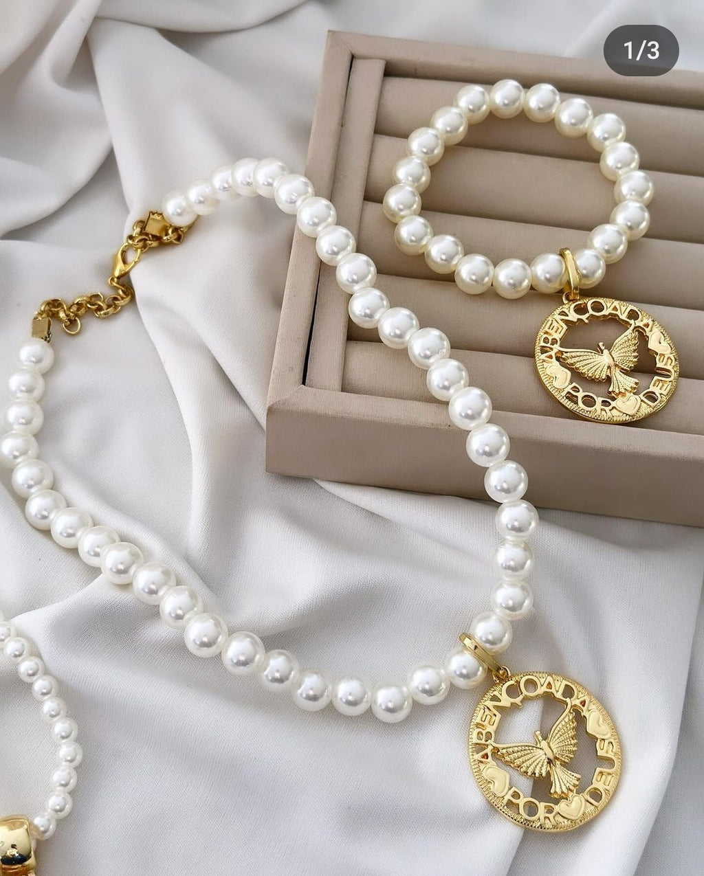 Colar e pulseira Folheado a ouro 18k Pérola e Espírito Santo .