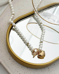 Colar Folheado a ouro 18k e folheado a prata Pérola e coração.