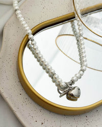 Colar Folheado a ouro 18k e folheado a prata Pérola e coração.