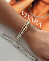 Pulseira Folheado a ouro e a prata triplo Pérola e zirconias com pingente inspiração Virginia.